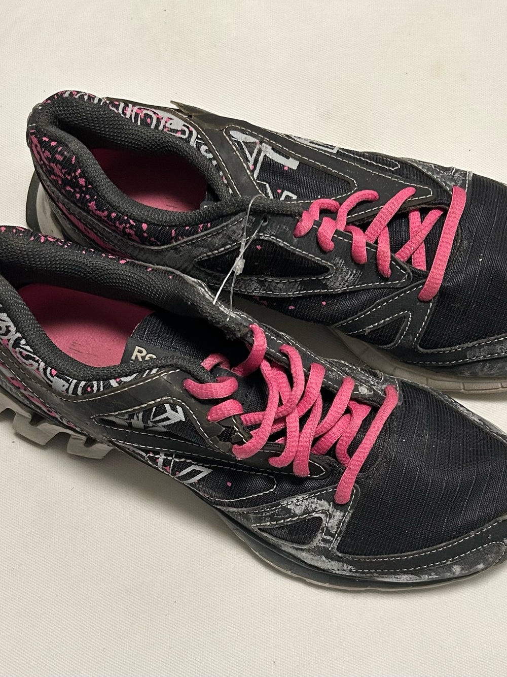 Reebok Women's Black Athletic Sneakers with Pink Laces and Accents